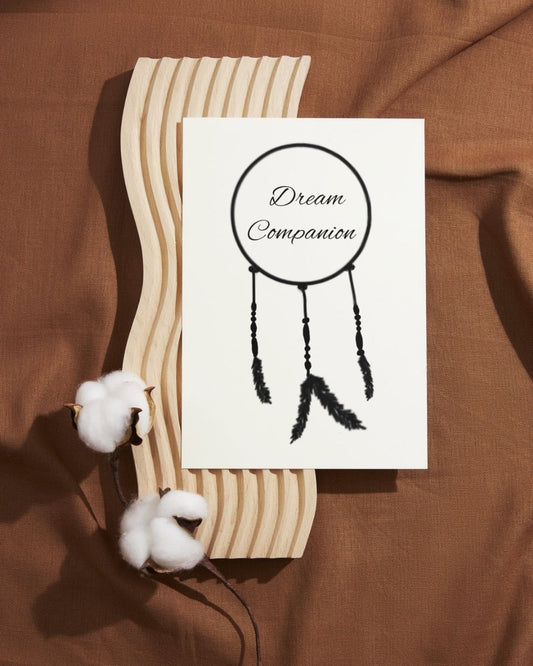 dream companion cover on an ornamental wavy tray, with cotton and a brown cloth background
